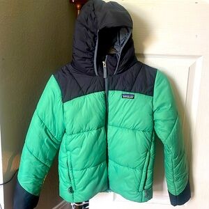 Boys Patagonia jacket with hood. Size 10. Green with navy blue hood.